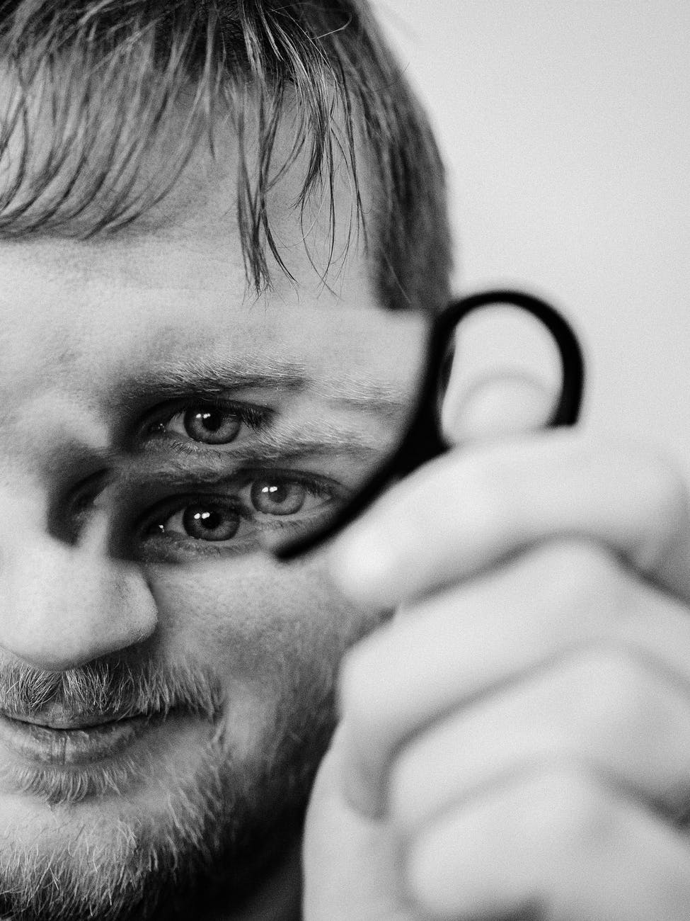 man holding kaleidoscope